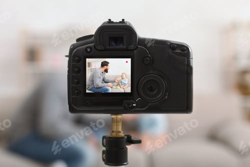 Preview: Millennial dad recording blog about feeding baby