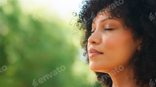 Preview: Woman Meditating Outdoors With Eyes Closed in a Natural Setting on a Sunny Day