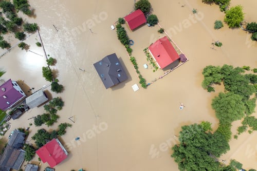 Preview: Aerial view of flooded houses with dirty water of Dnister river in Halych town, western Ukraine