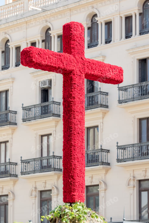 Preview: Christian cross covered with red flowers