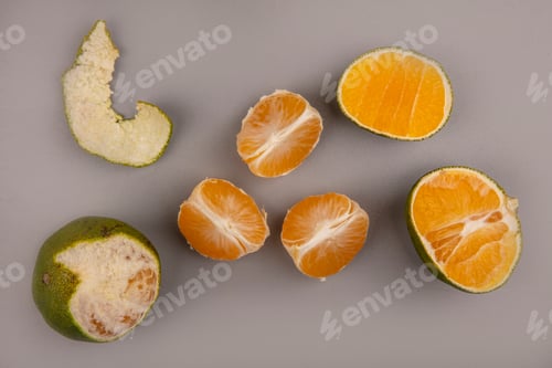 Preview: top view of fresh green tangerines isolated on a grey background