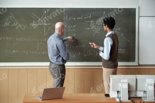 Preview: Professor and student discussing solution of equation while teacher pointing at one of derivative