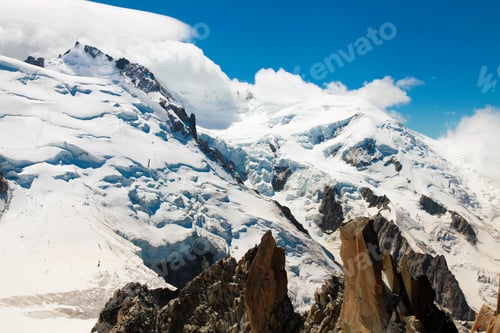 Preview: French Alp mountains covered in fresh white snow. Mountaineering, travelling.