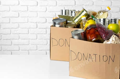 Preview: Donation box with various food. Pandemic support
