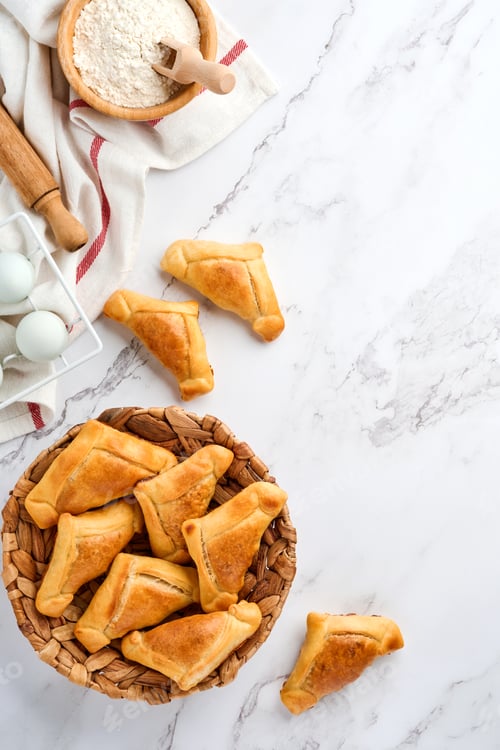 Preview: Fried empanadas with cilantro, meat, egg, tomato and chili sauce on white background. Latin American
