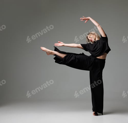 Preview: Dancer in black outfit performs dynamic pose with raised leg and arms extended forward