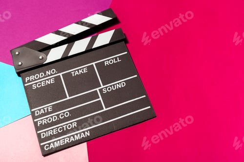 Preview: Clapperboard on colorful background ready for filmmaking and movie production