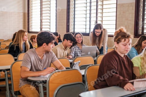 Preview: University professor explaining individually to her students at her table in class