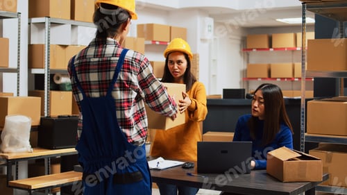 Preview: Team of people unboxing packs for stock logistics