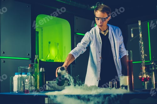 Preview: Young chemist making experiments in laboratory