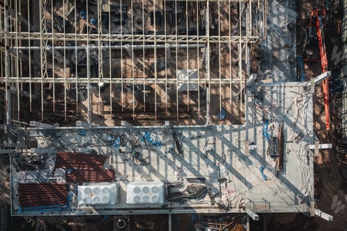 Preview: Aerial View Construction Site. Workers Fixing Grid Foundation Bars.