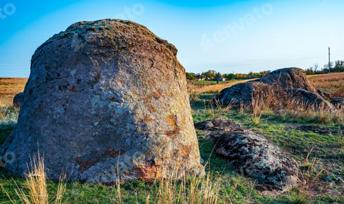 Preview: Huge deposits of stone minerals in a clearing bathed in warm sun in picturesque Ukraine