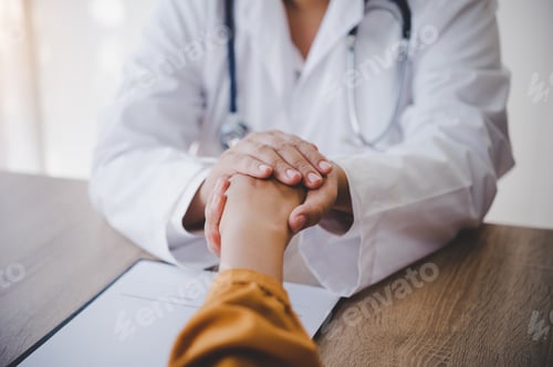 Preview: Close-up of the psychiatrist's hand holding the patient's hand. To encourage and comfort the patient