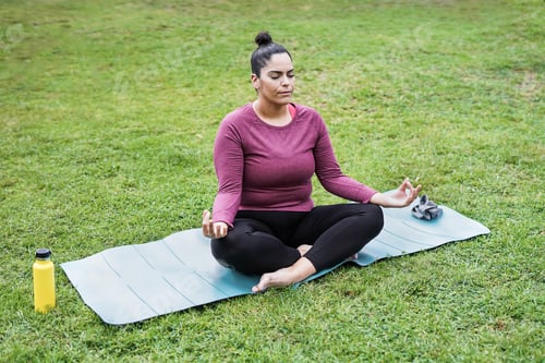 Preview: Young woman doing yoga meditation outdoor - Healthy lifestyle and sport concept