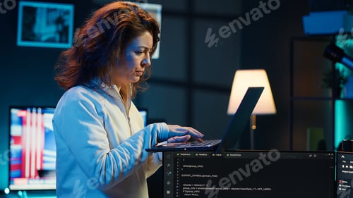 Preview: Woman walking around home fixing coding issues, upset about errors