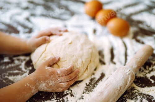 Preview: Children hands kneading dough for baking. Kids hands, some flour, wheat dough. Cookies for Christmas