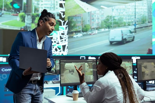 Preview: African american woman consulting indian team leader about order logistics