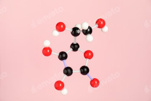 Preview: Molecule of vitamin C on pink background. Chemical model