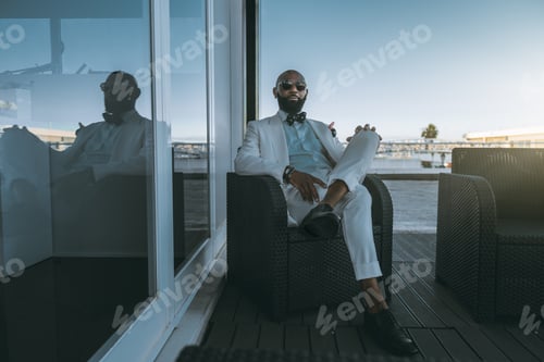 Preview: Dapper African man, esplanade