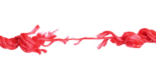 Preview: Rupture of red climbing rope on white background