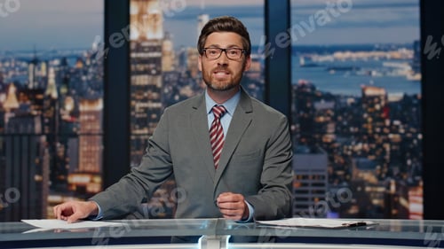 Preview: Newscaster presenting breaking news in evening television closeup. Man reporting