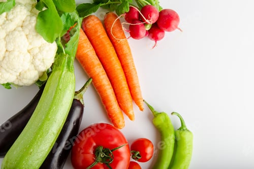 Preview: Isolated group of winter season vegetables over white flat lay view. Includes copy space.