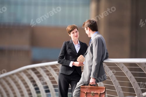 Preview: Business people talking outdoors