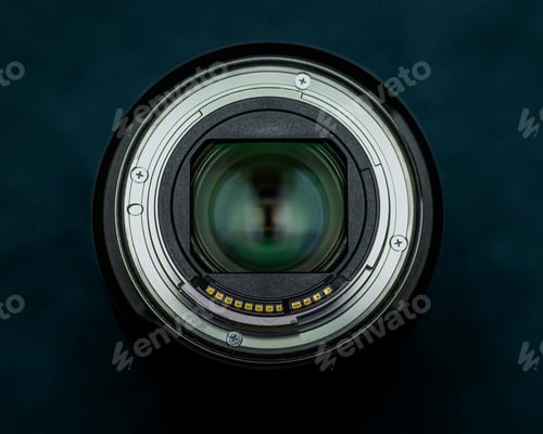 Preview: Canon RF 24-70 F2.8 IS USM mirrorless full frame lens on a dark background