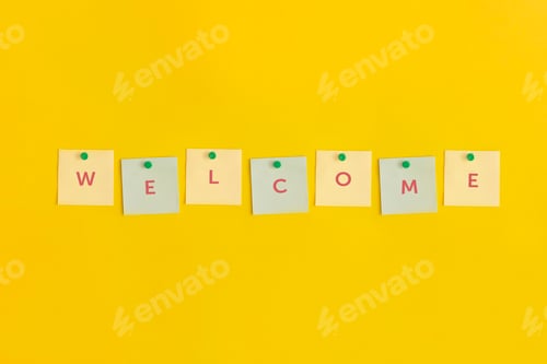 Preview: Sticky note with text Welcome on yellow background