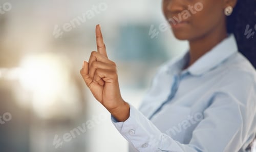 Preview: Business woman with her index finger, stop and wait gesture. Black woman in the office holding her