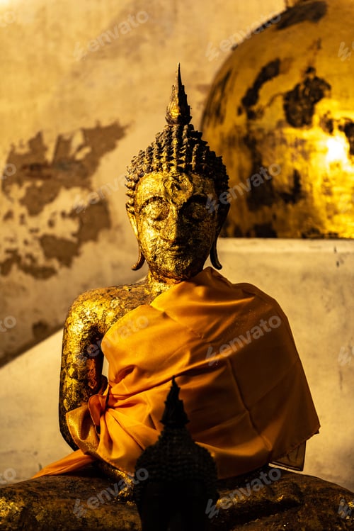 Preview: Ornately decorated Buddha statue in front of a large golden sphere-like structure
