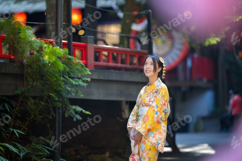 Preview: Woman wear Japanese yellow kimono at outdoor