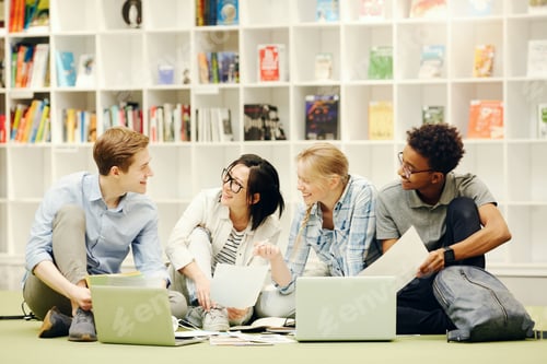 Preview: Students working on research project in library
