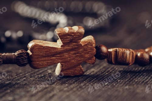 Preview: wooden cross on wood background. creative photo.