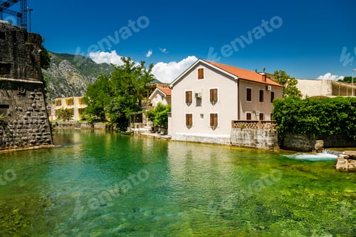 Preview: Beautiful view with residential houses by the river Scurda in the old town of Kotor