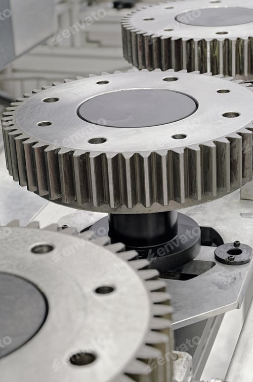 Preview: Large gearwheels on a production line conveyor