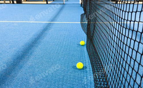Preview: Blue paddle court, with balls. With view of the net and the lines