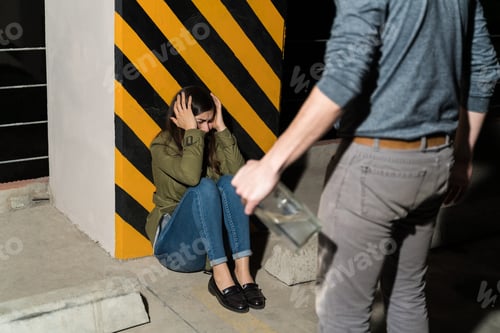Preview: Abusive Man Harassing Woman Against Striped Column
