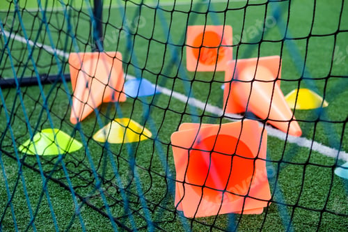 Preview: Soccer goal and cones on green artificial turf