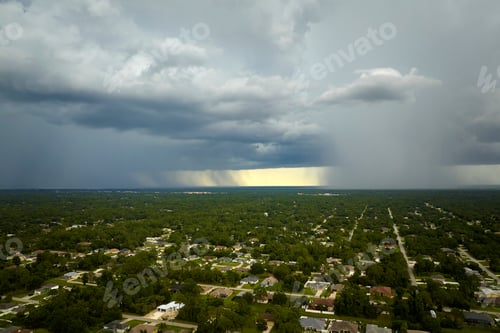 Preview: Landscape of dark ominous clouds forming on stormy sky during heavy thunderstorm