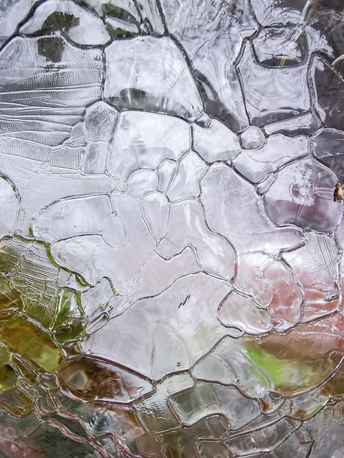 Preview: Closeup shot of details of the cracked ice texture in the wintertime