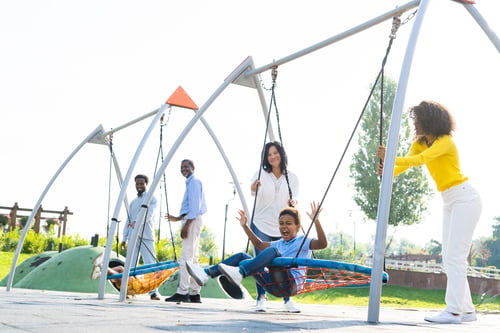 Preview: Beautiful happy african american family bonding at the park