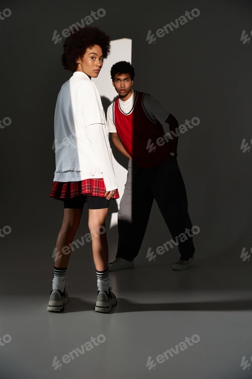 Preview: Stylish young couple embracing romance in an artistic studio setting