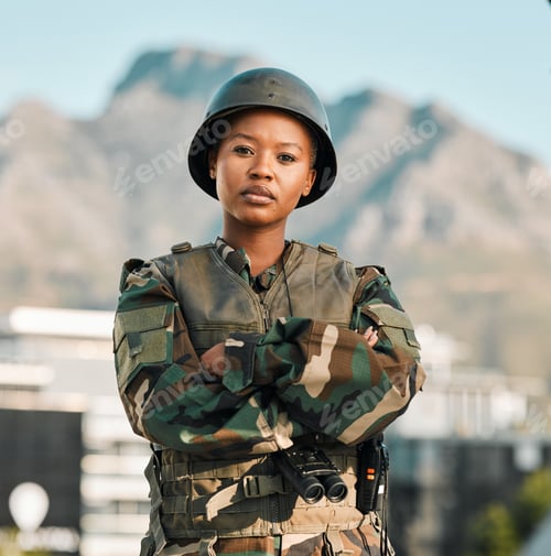 Preview: Soldier, portrait and black woman with arms crossed in city for power, confidence and mindset outdo