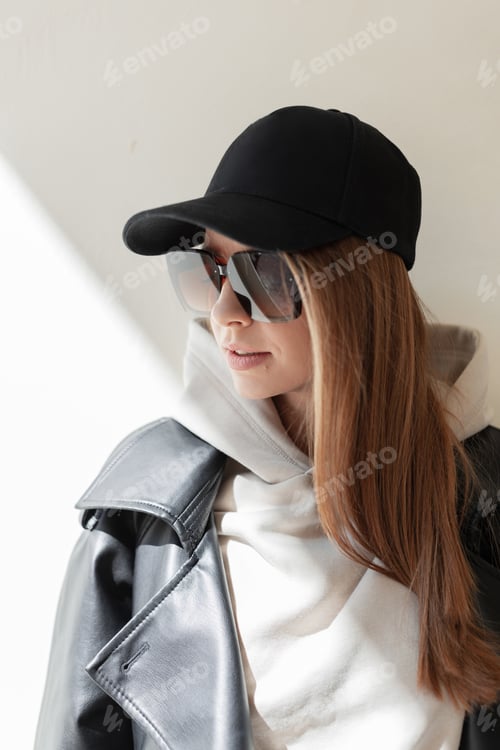 Preview: Stylish beautiful fresh woman in fashion clothes walking on a spring day