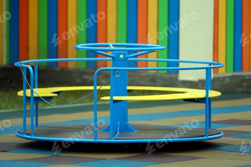 Preview: Beautiful playground in kindergarten with soft pavement, bright swings