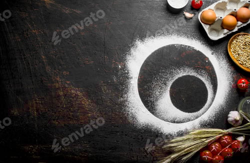 Preview: Flour Circle with Wheat and Eggs on Dark Surface