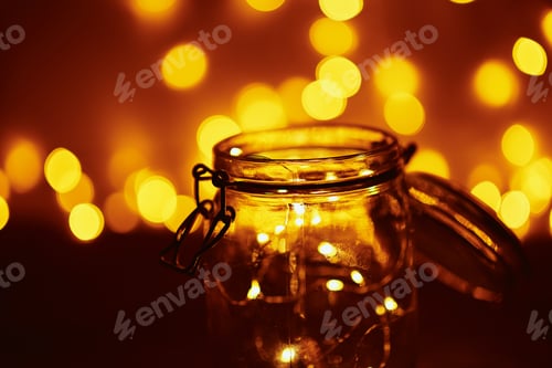 Preview: Background of golden lights in a bokeh. Defocused abstract blurred lights