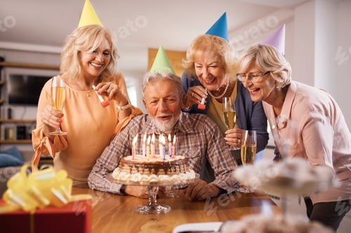 Preview: Group of happy mature friends celebrating Birthday at home.