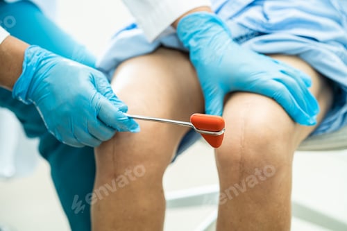 Preview: Asian doctor use hammer knock senior woman patient to check knee reflex, nerve and muscle